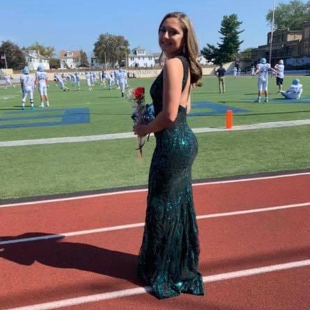 2 prom dresses white one $300 or best offer green one $90 or best offer